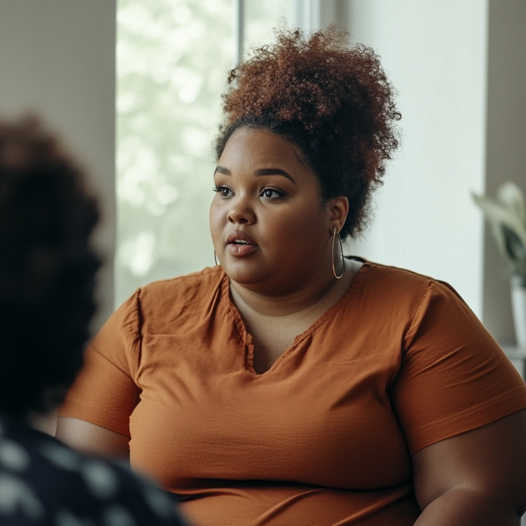 Black woman in therapy session receiving culturally affirming individual counseling